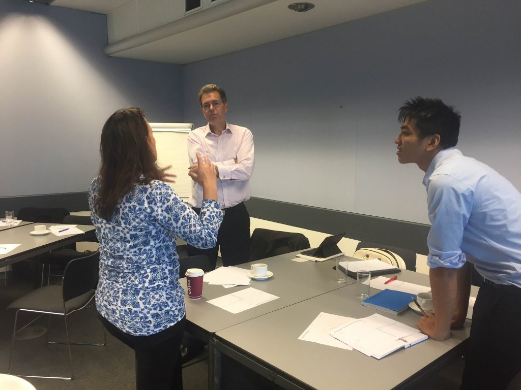 People talk about ideas in an office at the London City Hall