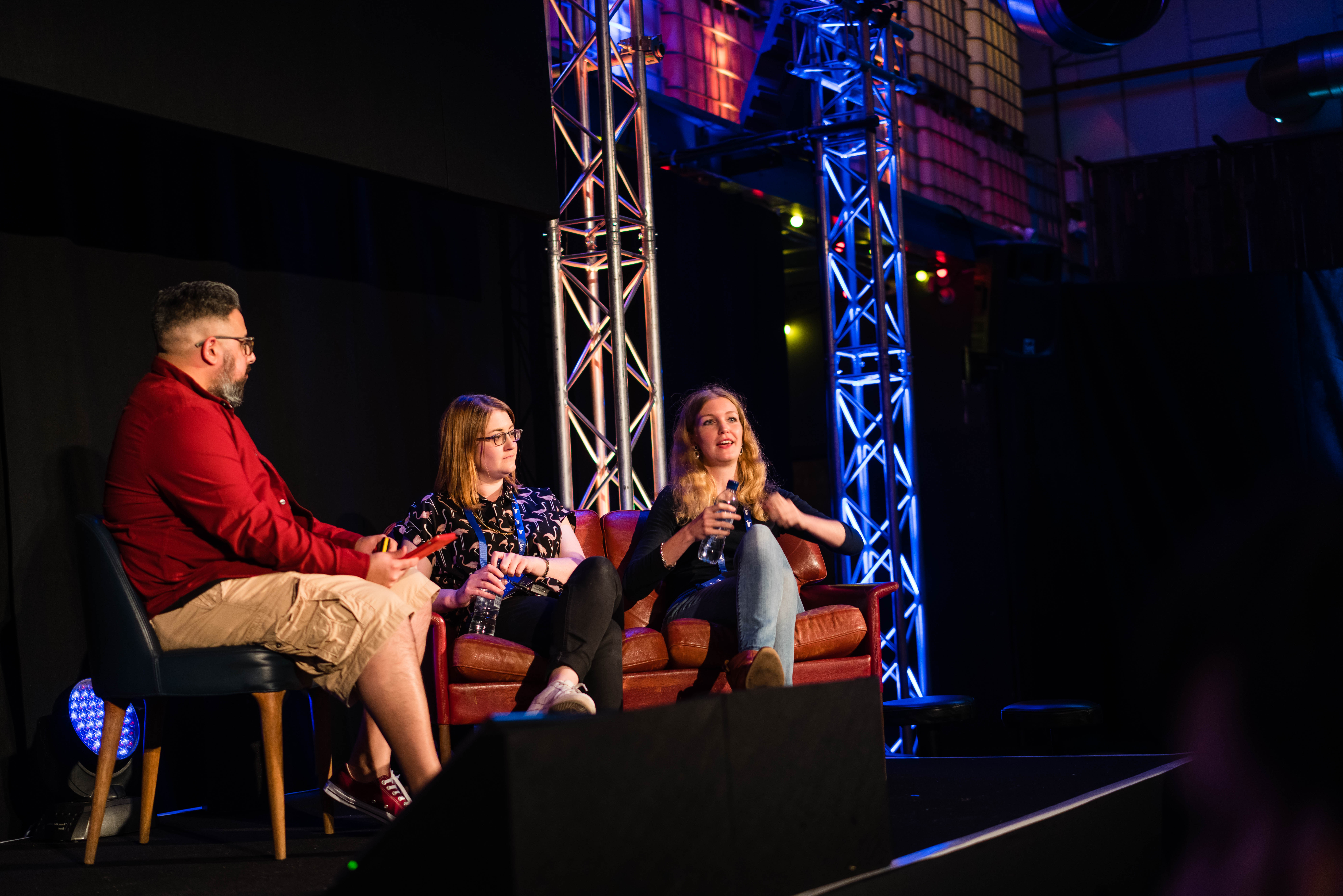 Three people talk on stage at the JAM 2017 event