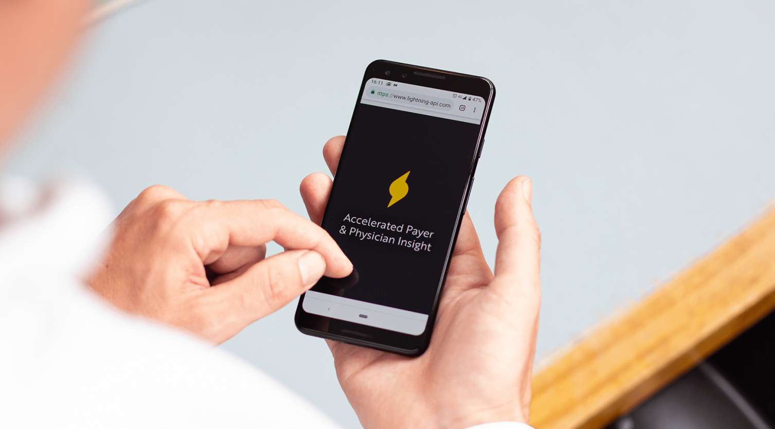A person uses the Lightning API platform on their mobile phone