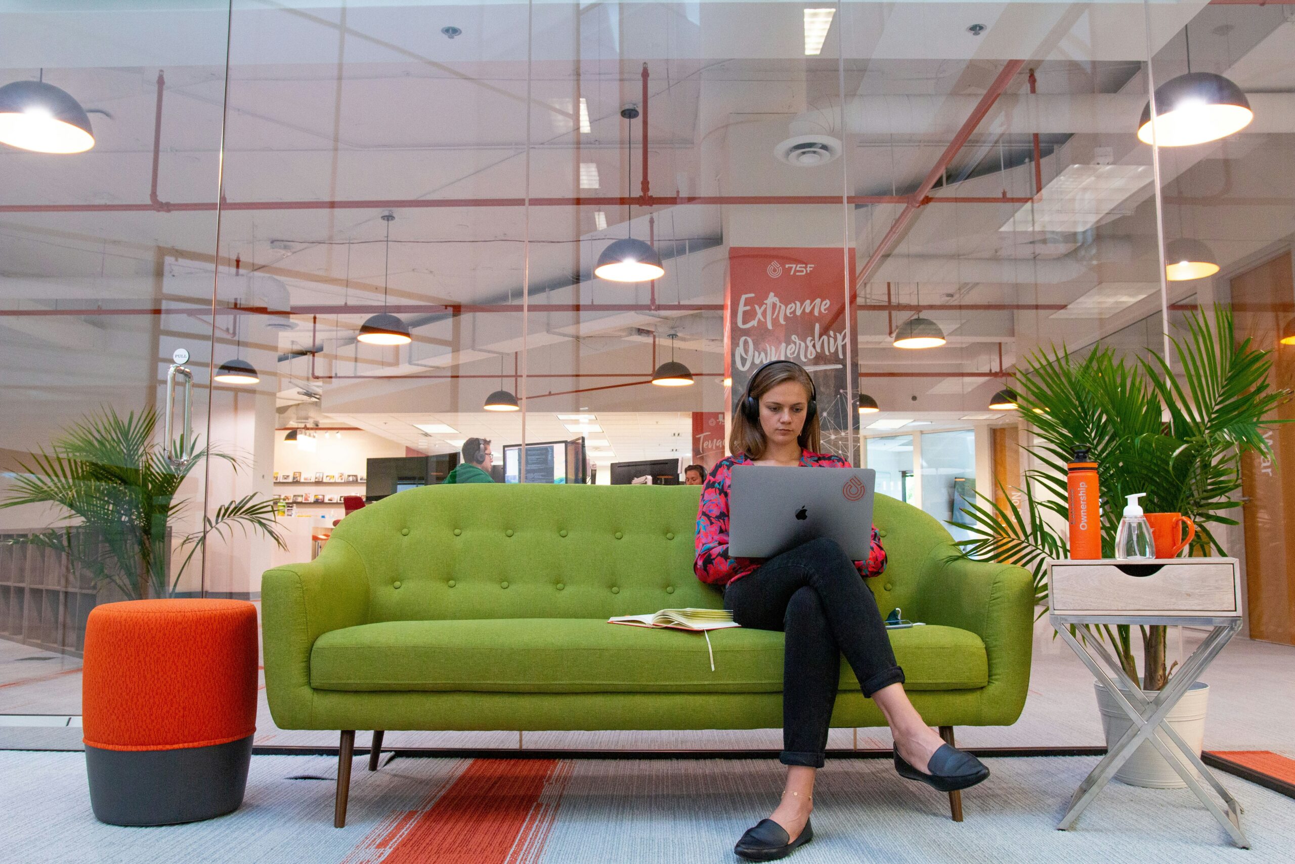 girl working on laptop in cool office