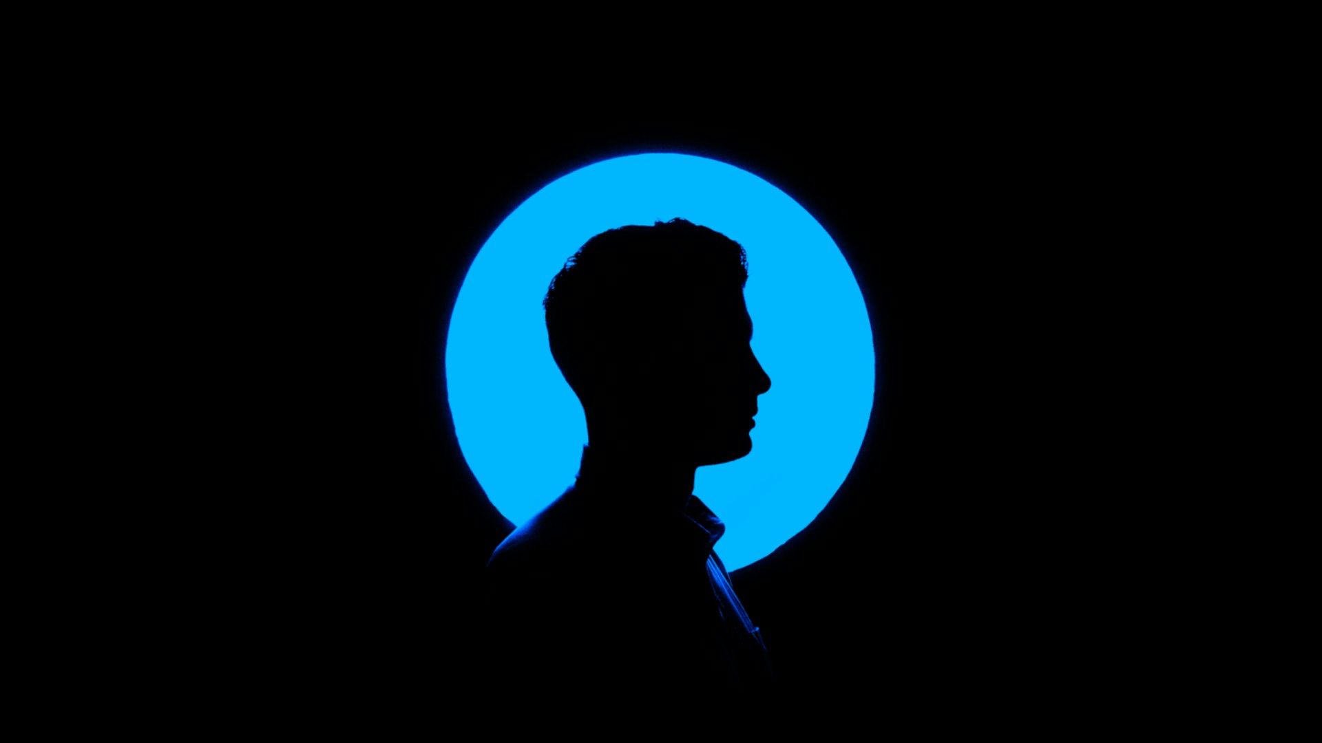 man thinking on blue background
